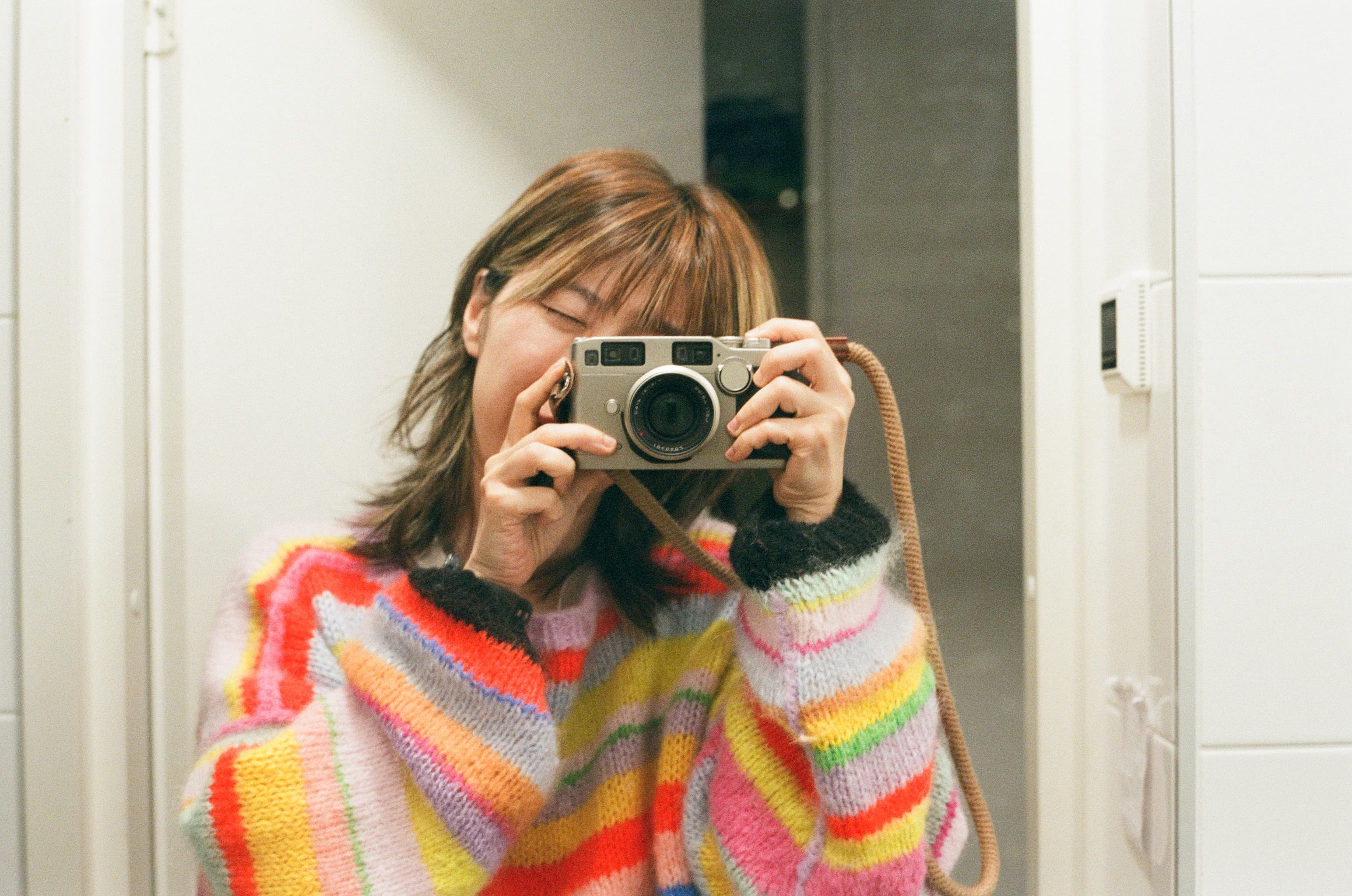 Photo of myself taking a photo of myself with a film camera